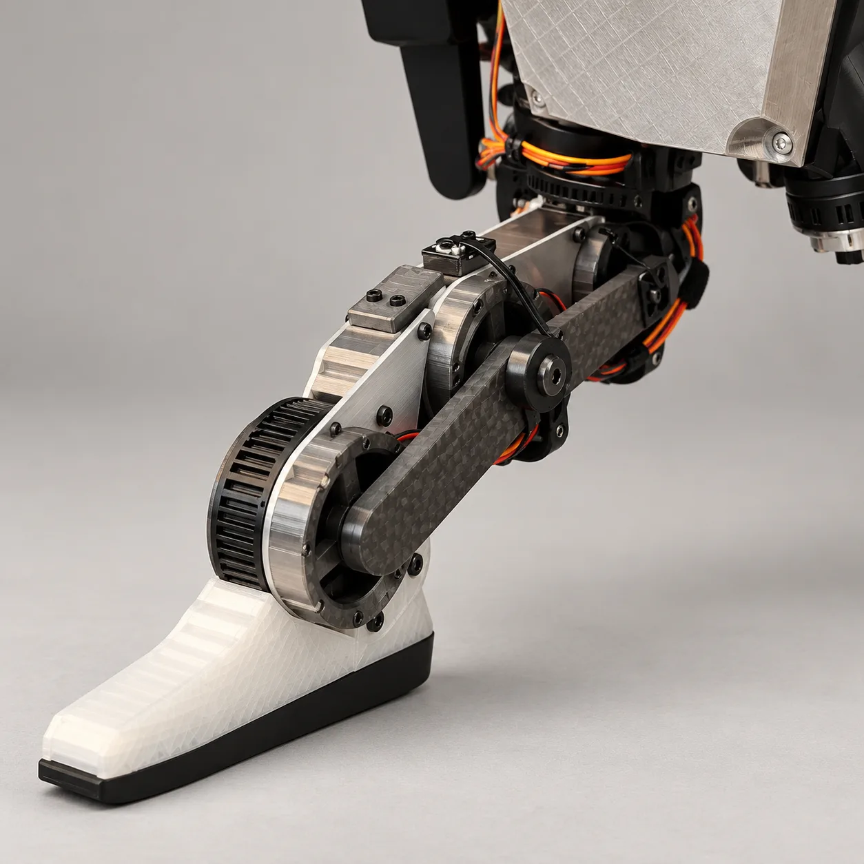 Close-up of V1's leg with belt-driven knee and wedge foot